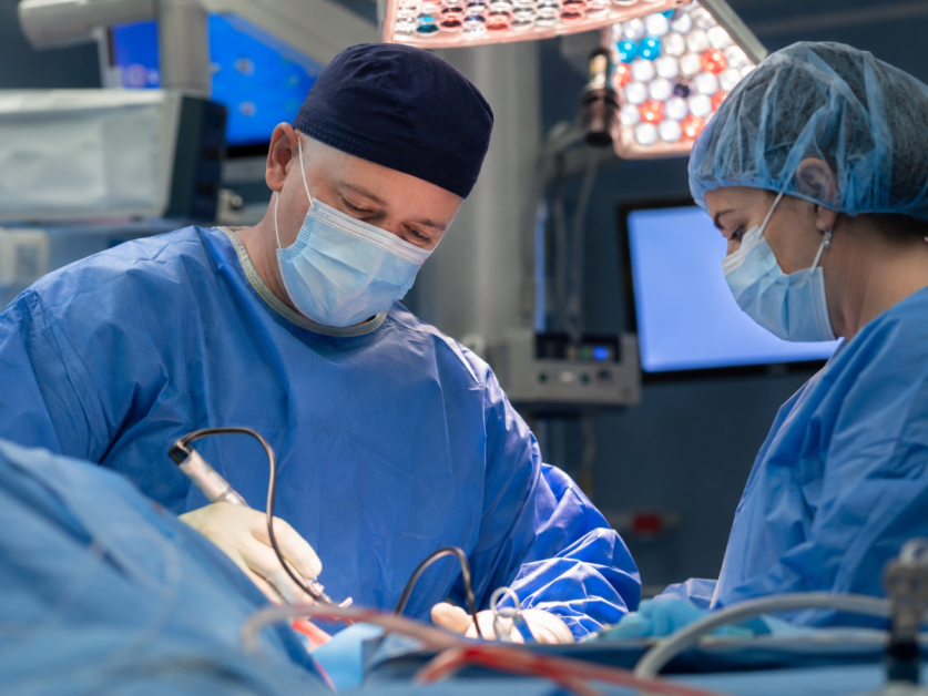 Alexander H. Tejani, M.D., an orthopedic surgeon performs surgery on patient