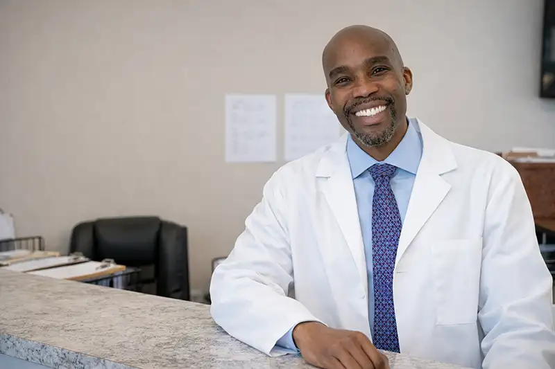 Dr. Uche Eneanya, board certified pain doctor for Comprehensive Pain Solutions.png
