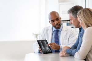 Patient discussing nonsurgical back pain treatment options with a pain management doctor in New Jersey